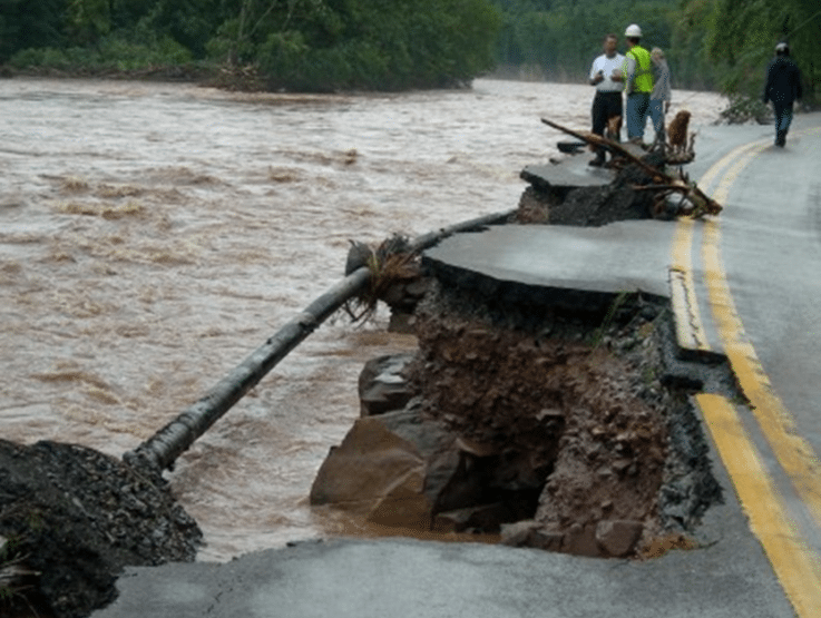 A pipeline is exposed by erosion caused by flooding.